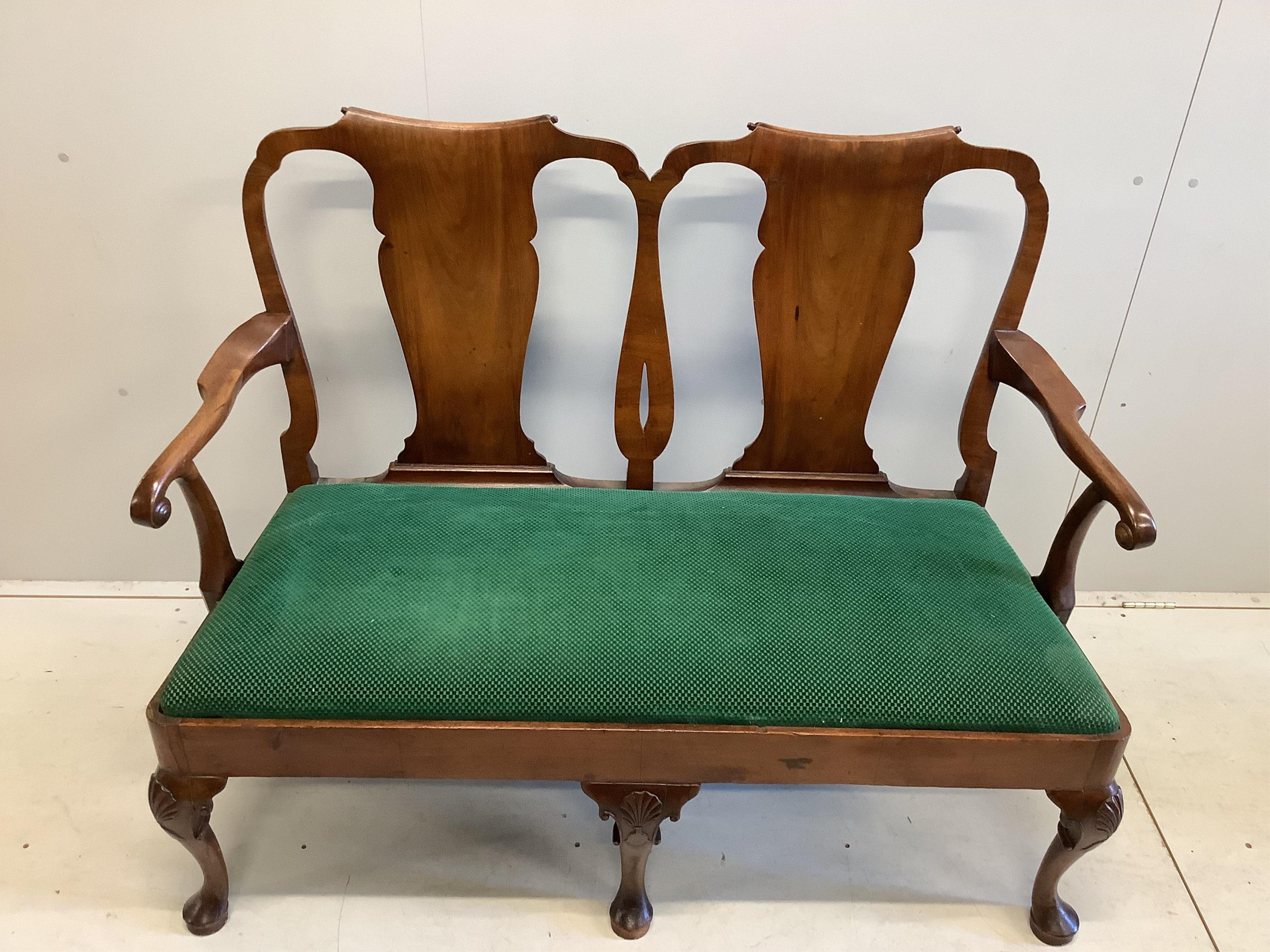 A George I style walnut double chair back settee on shell carved cabriole legs, width 128cm, depth 55cm, height 103cm. Condition - fair